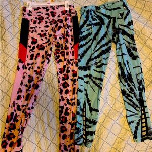 Girls, 1pr pink Justice leggings, 1pr blue capri leggings .